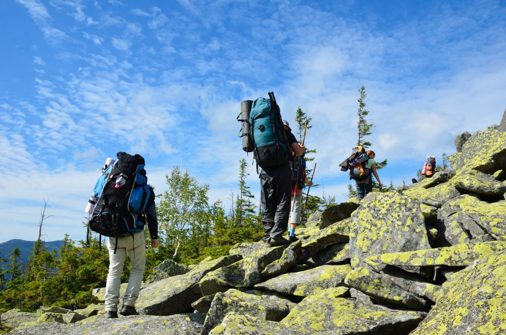 Hikers climbing up the mountain.